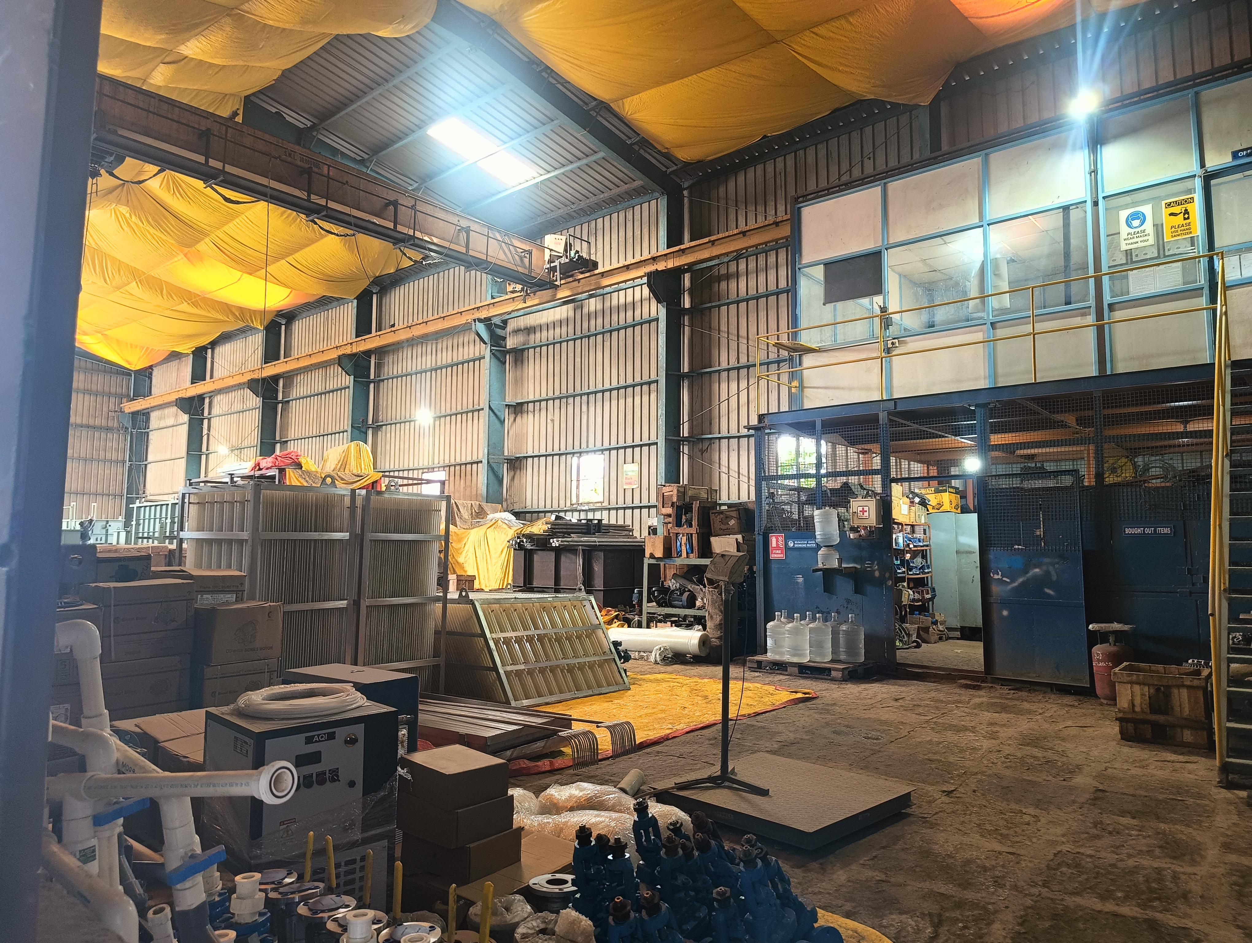 Peenya production floor with equipment and QA infrastructure