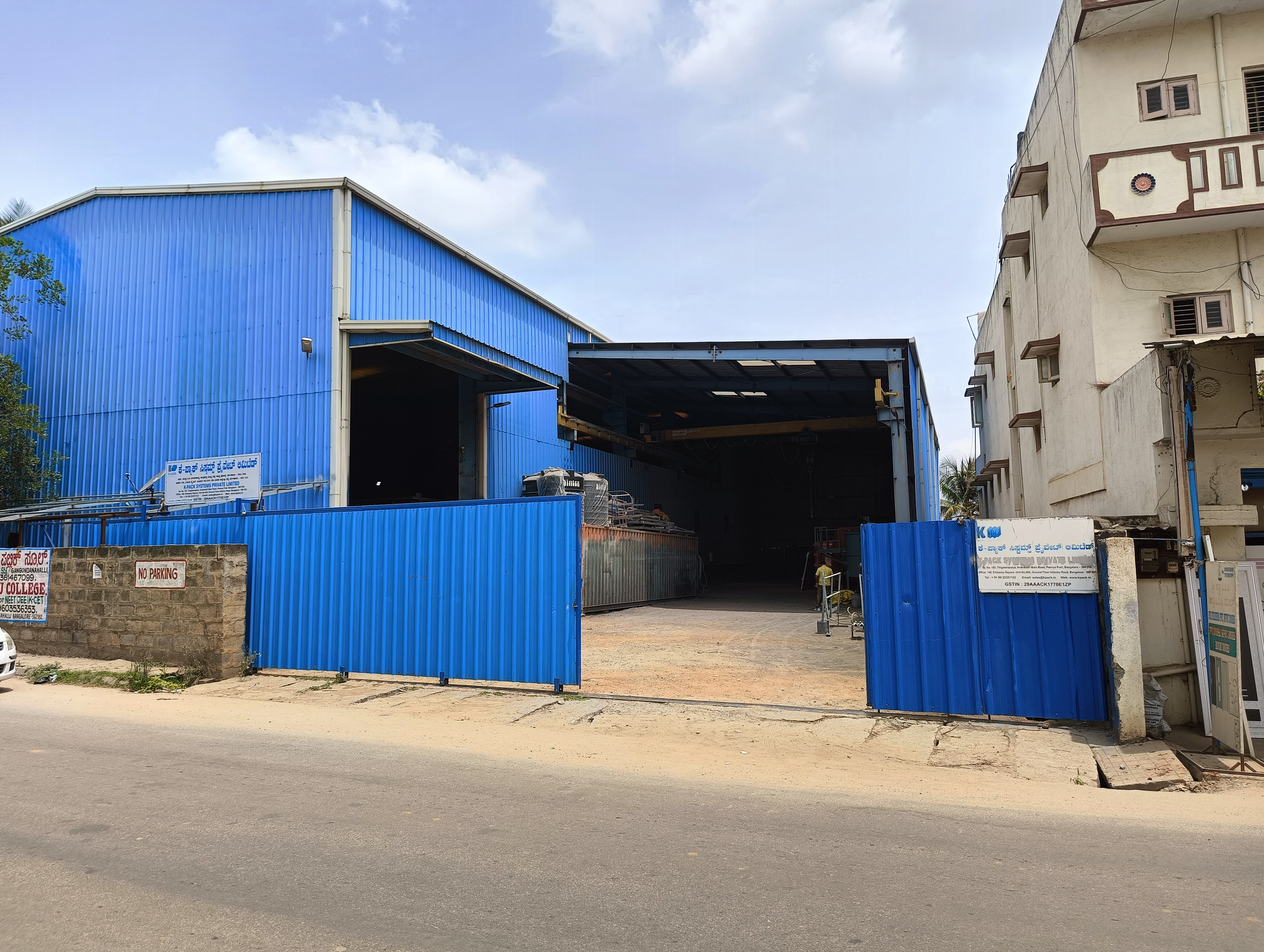 K-Pack Systems Peenya facility entrance with company signage