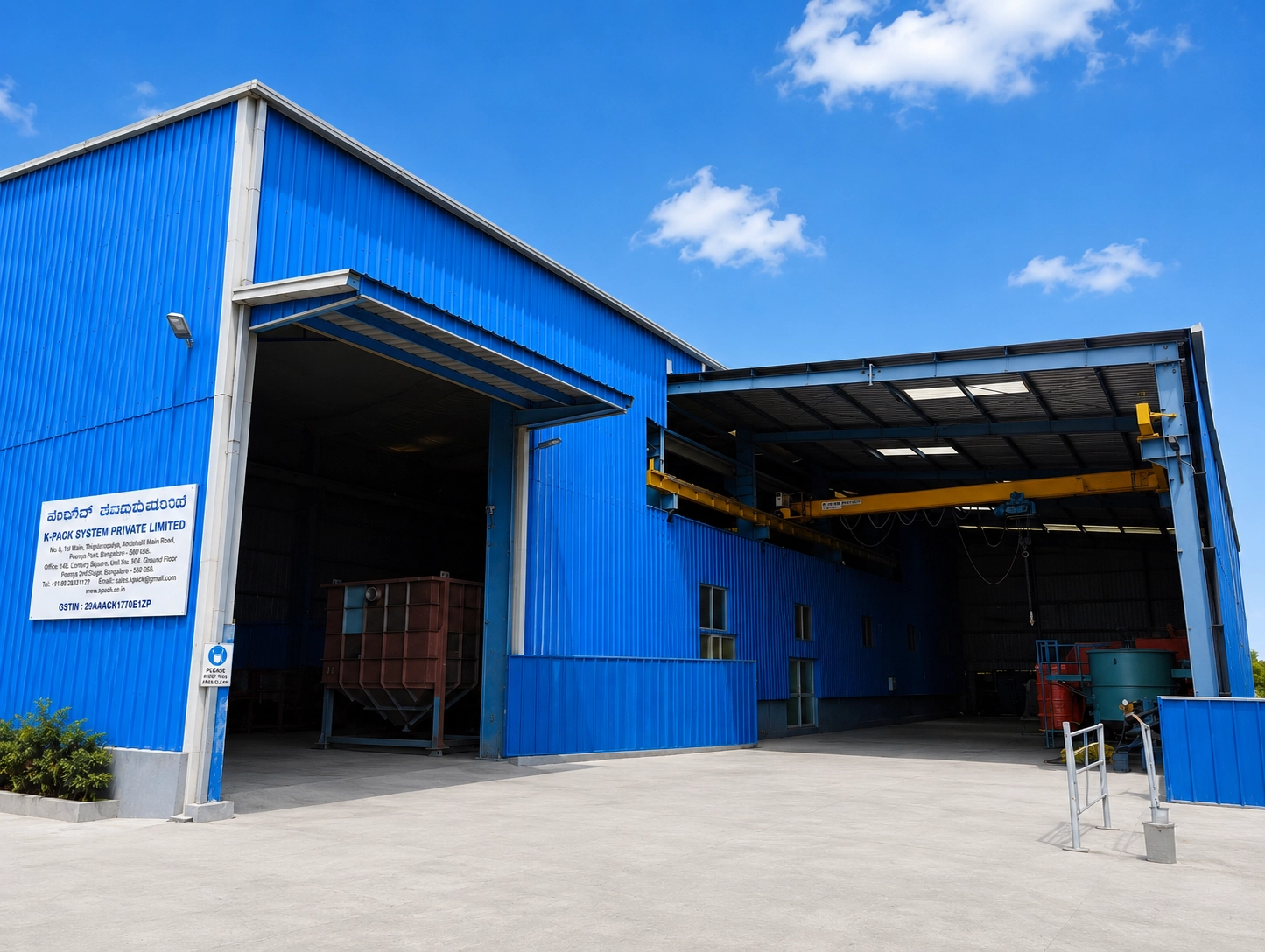Peenya manufacturing facility exterior with overhead crane